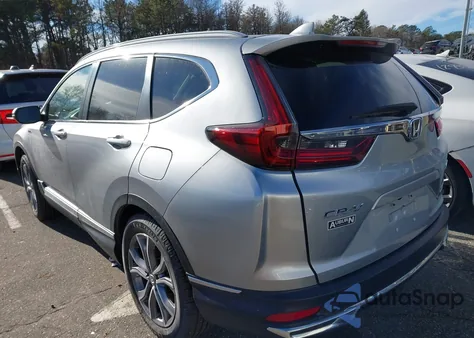 2021 Honda Cr-V Hybrid Touring z USA, uszkodzony, nr VIN 7FART6H93ME038094